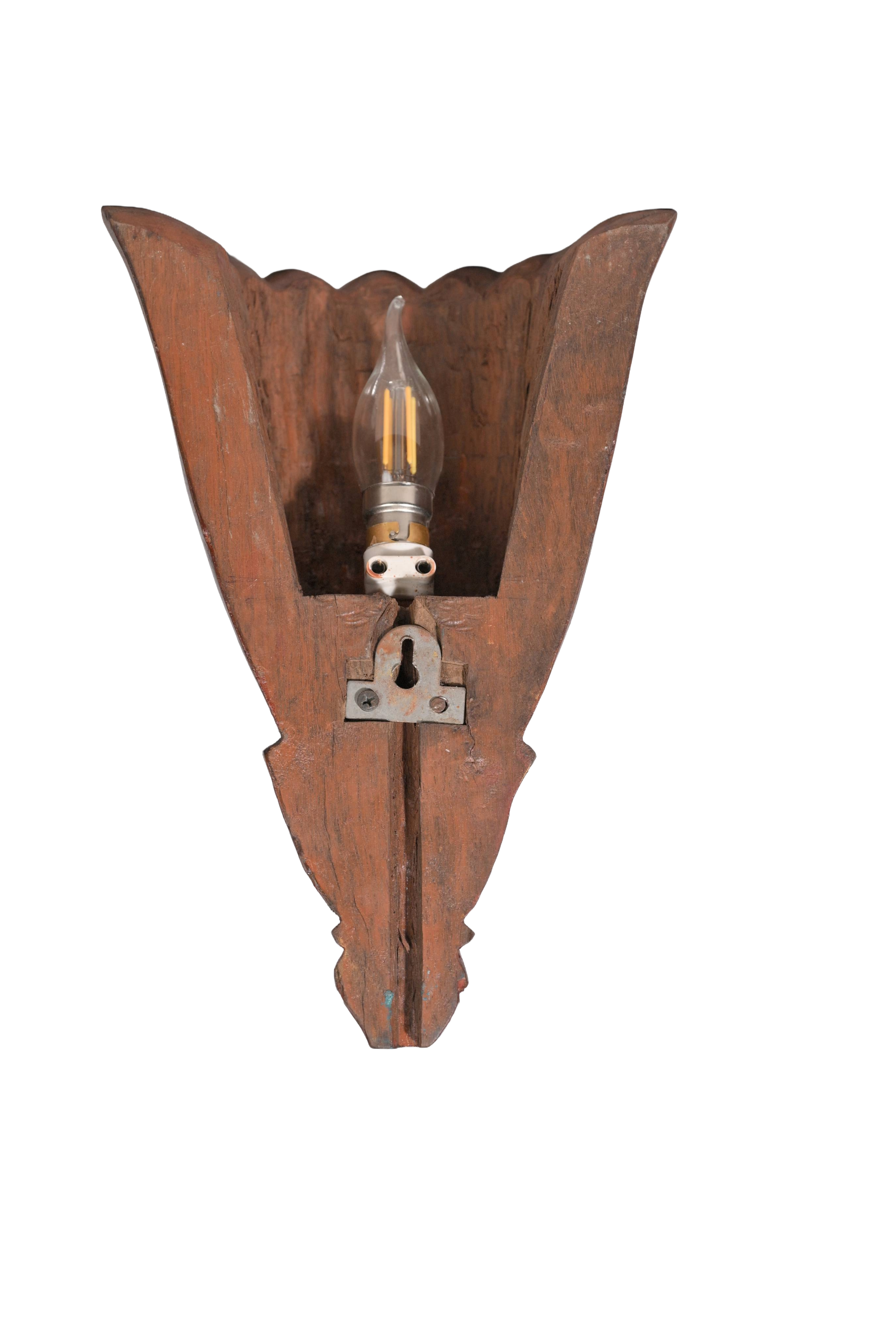 Carved Architectural block converted into wall lamp